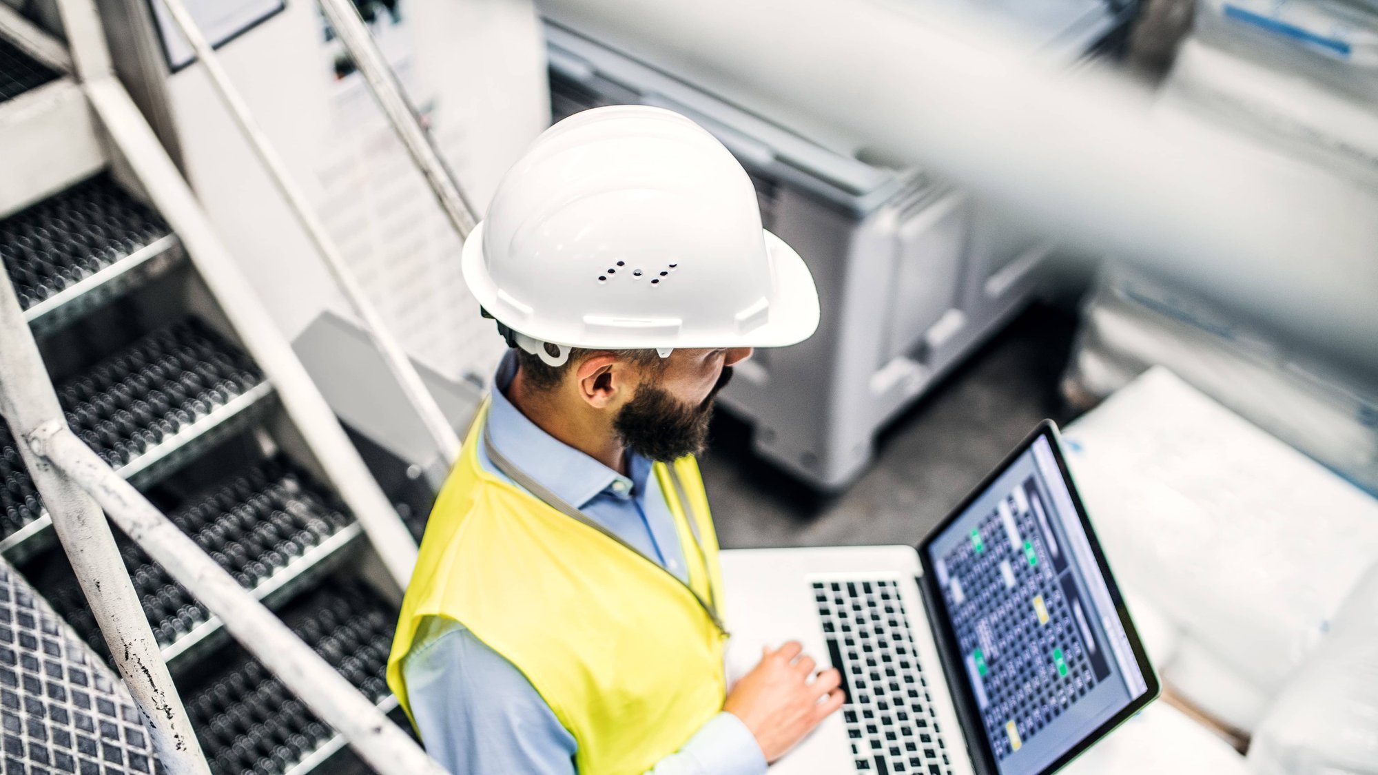 Cybersecurity in Utilities man inspecting